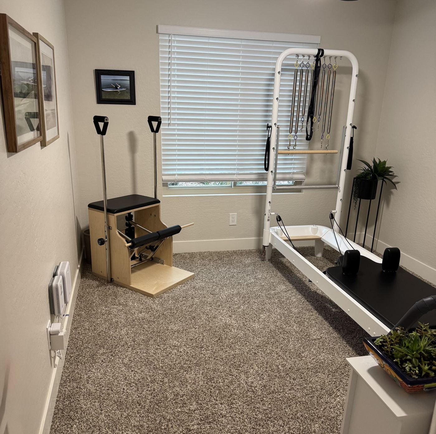 The in-home Pilates studio, with Reformer, Cadillac, and chair